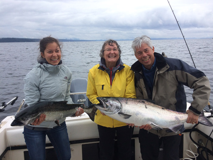 Ladies holding fish